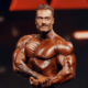 tanned-chris-bumstead-side-chest.webp