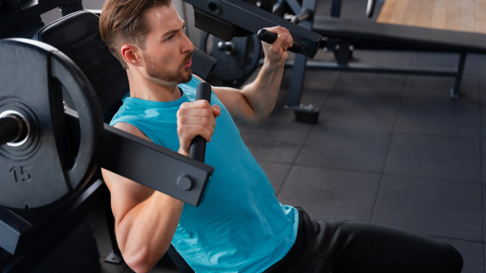 young-handsome-man-exercising-gym-bodybuilding.webp